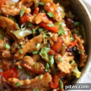 Crispy Vegan General Tso's Soy Curls 8 Vegan General Tso Soy curls in a speckled bowl