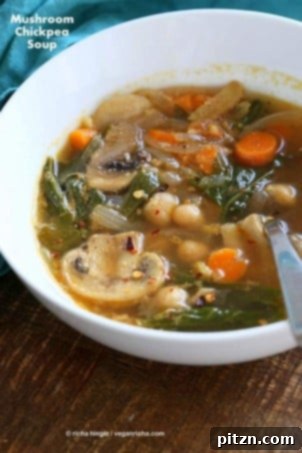 25 Easy Vegan Chickpea Recipes Healthy Dishes Beyond Curry 6 Warm and flavorful Mushroom Chickpea Soup with mixed vegetables and greens, a delightful winter broth soup with aromatic spices, suitable for a vegan and gluten-free diet.