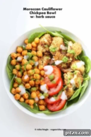 Colorful Moroccan Chickpea Cauliflower Bowl served with a fresh herb sauce, a delicious vegan, gluten-free, and soy-free option.