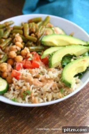 25 Easy Vegan Chickpea Recipes Healthy Dishes Beyond Curry 10 Masala Chickpea Bowl with Chana Masala Spice Cream Sauce, a hearty and flavorful vegan dish.