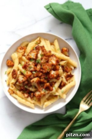20 Affordable Vegan Meals 12 Vegan Garlic Pasta with Roasted Cajun Cauliflower. Tender cauliflower tossed in homemade cajun spice, baked, and served over easy creamy garlic sauce penne pasta. A delicious vegan recipe, adaptable to be nut-free and gluten-free.