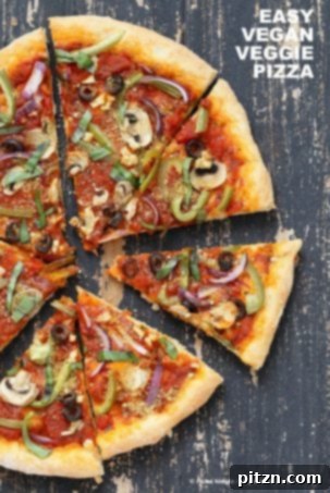 Easy Veggie Vegan Pizza with a 20-minute almost no-knead crust, topped with pizza sauce, mushrooms, Kalamata olives, and fresh basil. A delicious vegan and soy-free recipe, adaptable to be nut-free and gluten-free.