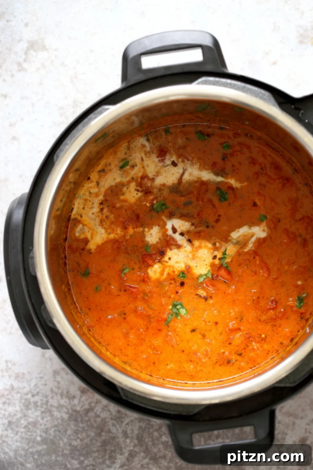 Instant Pot Vegan Tikka Masala 6 Close-up of freshly cooked Vegan Tikka Masala Sauce in the Instant Pot, highlighting its smoothness
