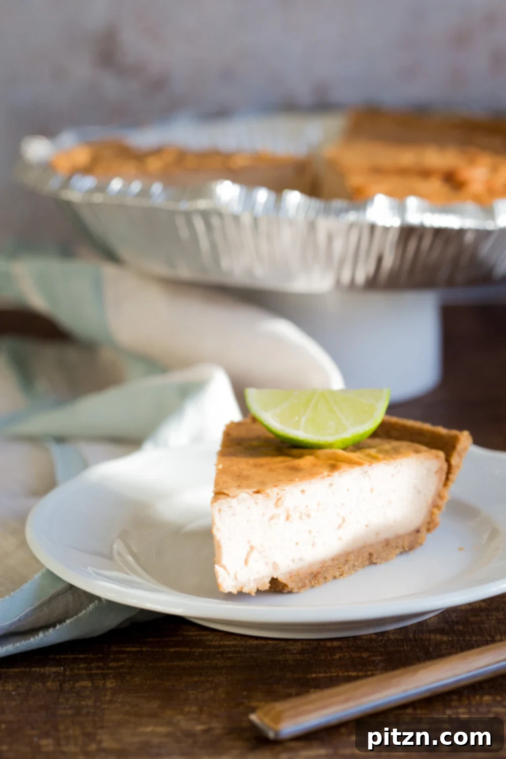 Naturally Sweetened Baked Vegan Gluten-Free Cheesecake 4 Baked Vegan Cheesecake. 8 Ingredients, no refined sugar. No prep and soaking needed. Perfectly creamy Date sweetened Cheesecake with Cashew butter. Easily Glutenfree with a glutenfree crust. #Vegan #Soyfree #Recipe #VeganRicha #cheesecake #vegancheesecake