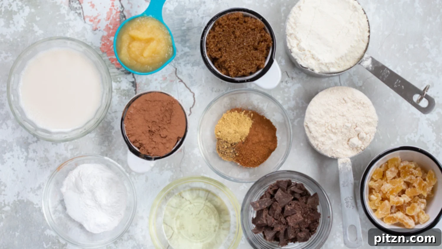 Ingredients for Vegan Chocolate Gingerbread Cake laid out on a table.