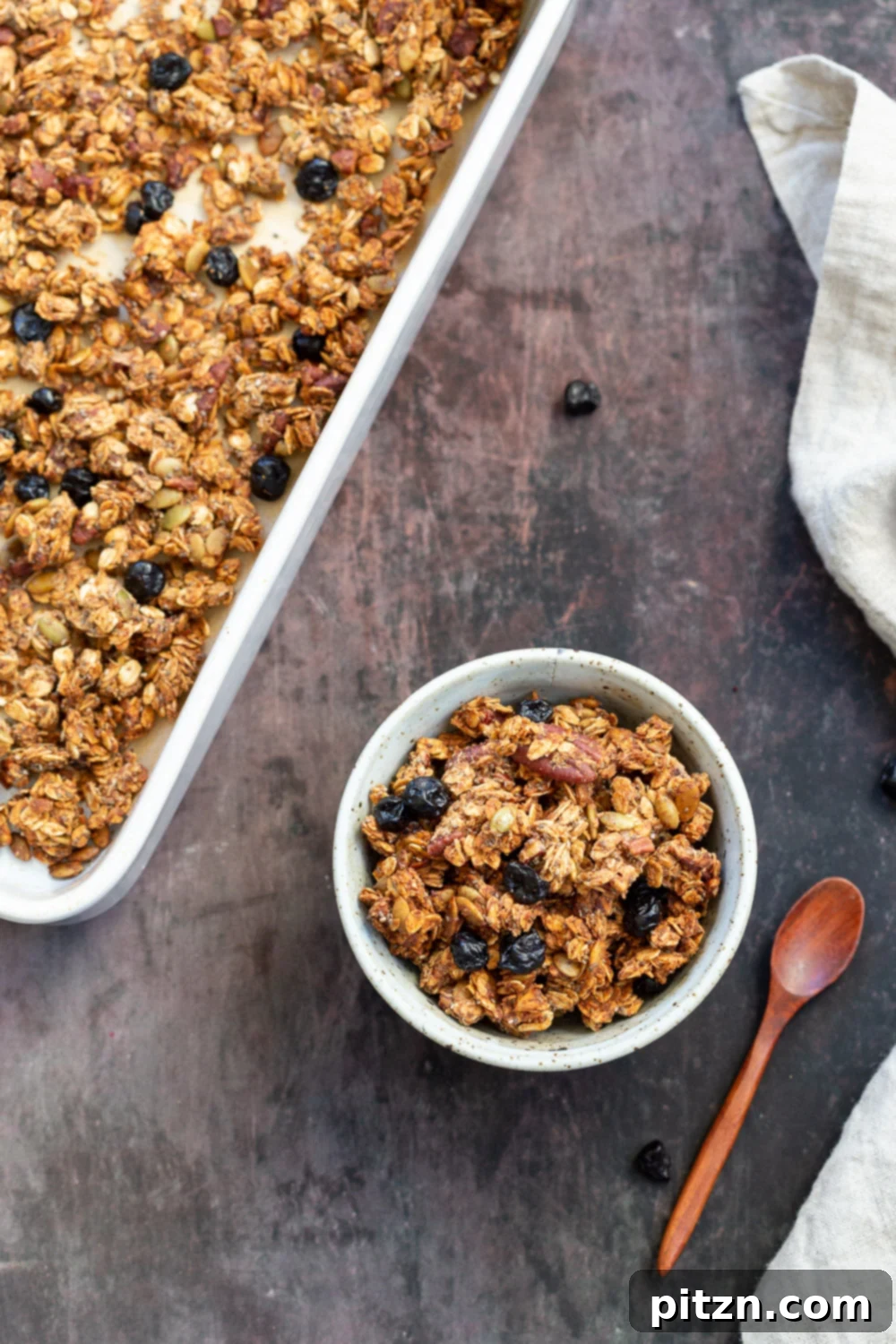 This Date Caramel Maple Pecan Granola is lightly sweet and perfect for any time. Pecans, Oats, coconut, pumpkin and chia seeds and dried blueberries tossed in date caramel and baked to perfection. #Vegan #Granola #Glutenfree #Soyfree #Recipe #VeganRicha Can be nutfree.