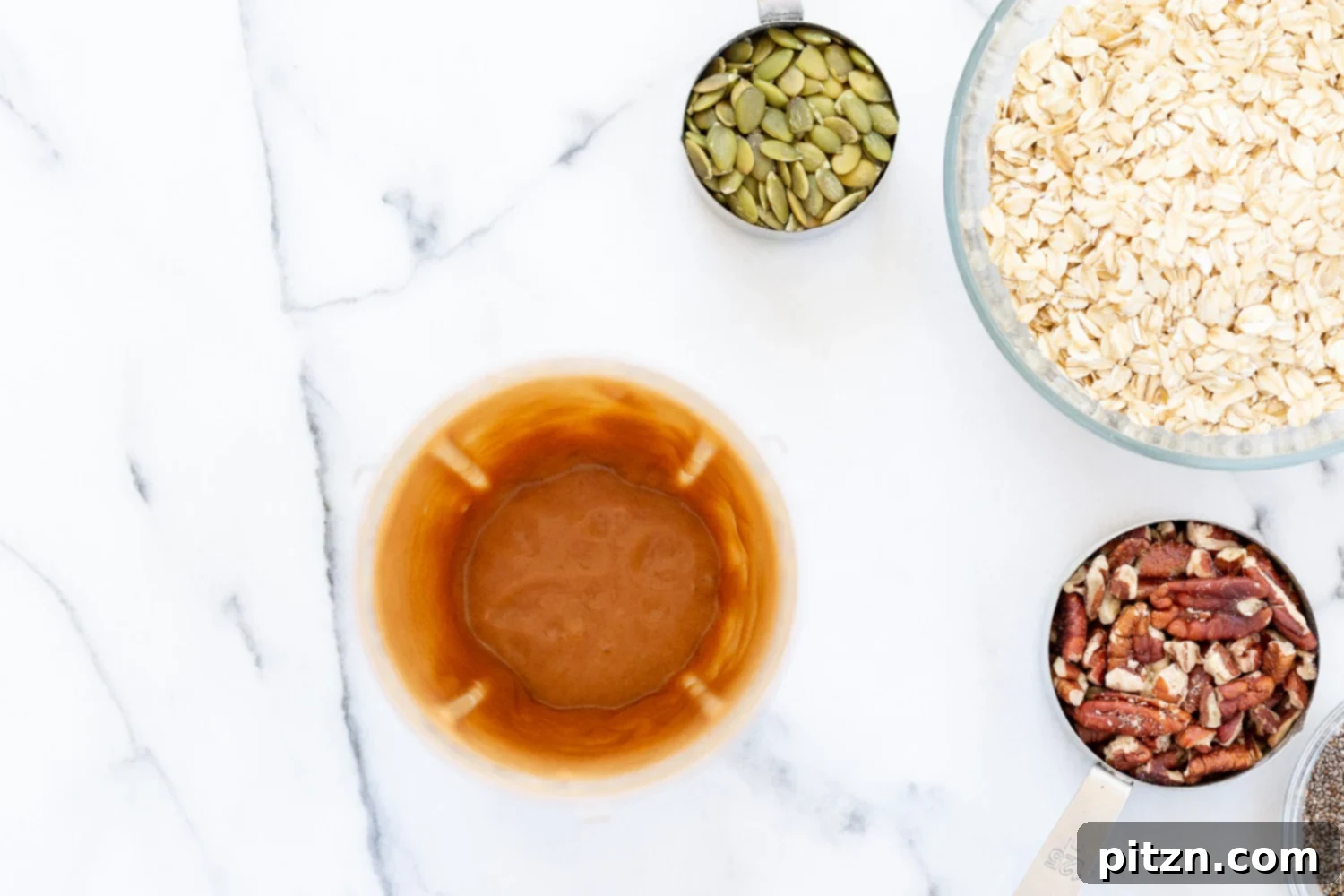 This Date Caramel Maple Pecan Granola is lightly sweet and perfect for any time. Pecans, Oats, coconut, pumpkin and chia seeds and dried blueberries tossed in date caramel and baked to perfection. #Vegan #Granola #Glutenfree #Soyfree #Recipe #VeganRicha Can be nutfree.