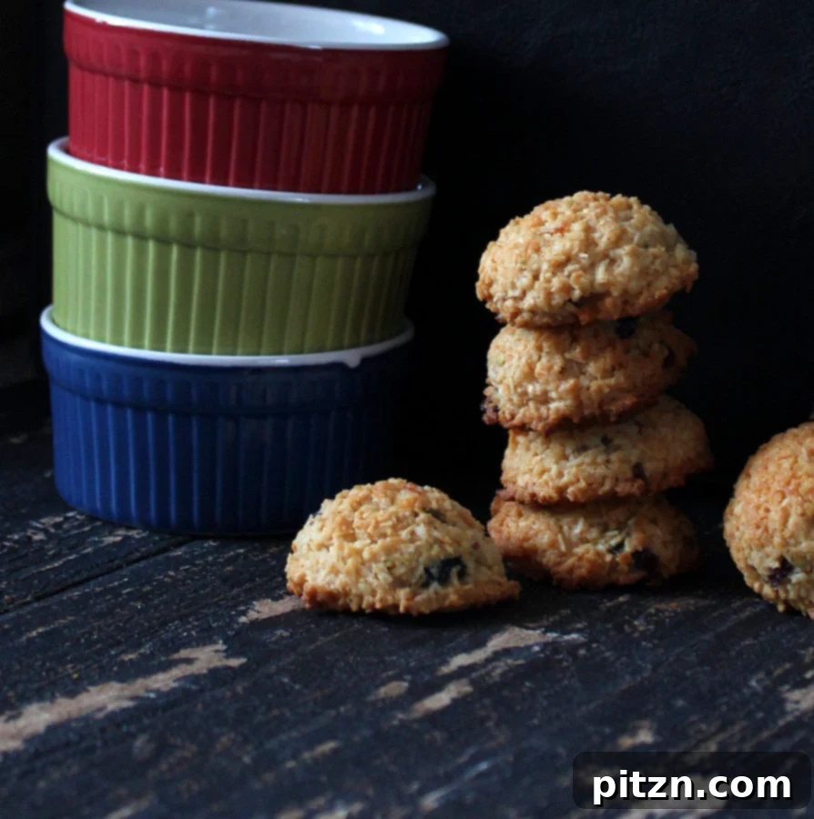 Tropical Zest Macaroons: Cranberry Pistachio Dream (Gluten-Free, Vegan) 4 Close-up of baked Zesty Coconut Macaroons, highlighting their perfect texture.
