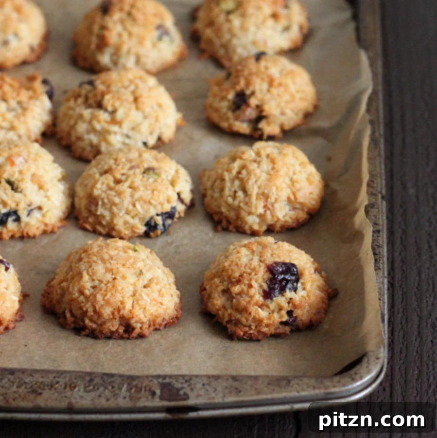 Tropical Zest Macaroons: Cranberry Pistachio Dream (Gluten-Free, Vegan) 3 A beautifully arranged plate of Zesty Coconut Macaroons, garnished for a festive look.