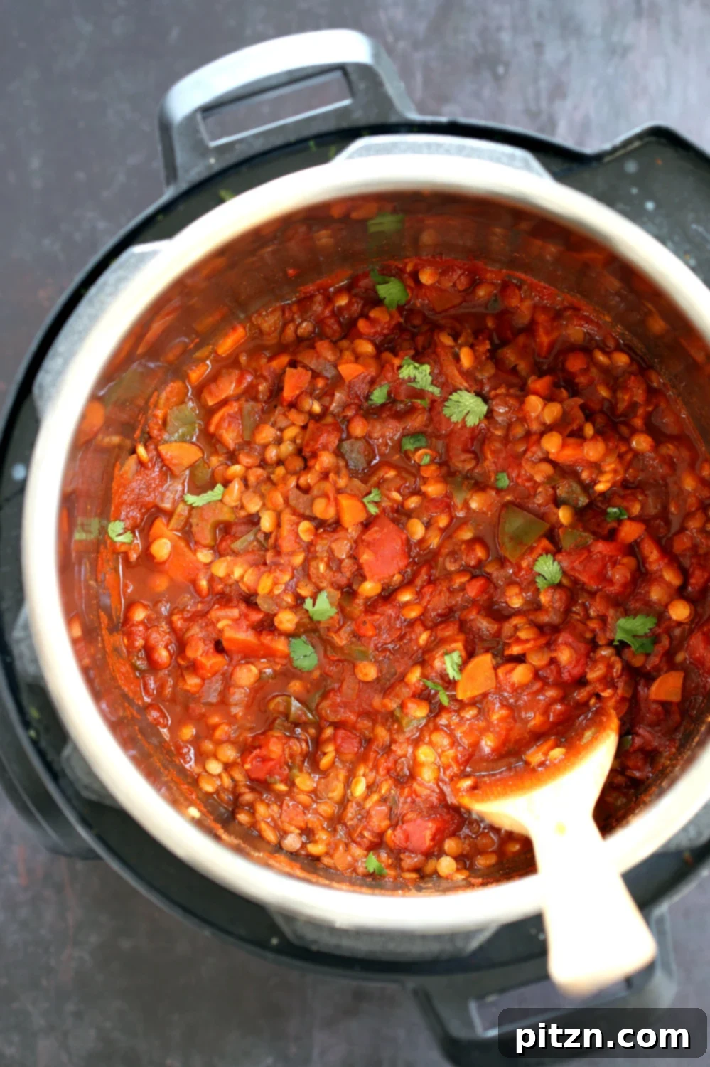 Savory Vegan Lentil Sloppy Joes 3 Preparing Instant Pot Vegan Lentil Sloppy Joes with fresh vegetables and lentils