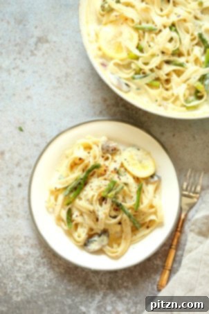 20 Must-Try Vegan Pasta Recipes 4 Vegan Lemon Asparagus Pasta - a 30-minute recipe! Creamy lemon alfredo-style sauce with tofu, served with fettuccine and pan-roasted garlic asparagus for a fresh and zesty meal. Vegan, nut-free, and can be gluten-free, offering 17g of protein.