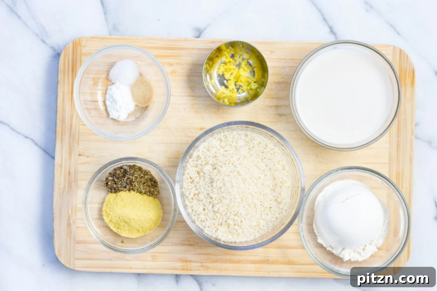 Three bowls for breading station: flour, non-dairy milk, breadcrumbs
