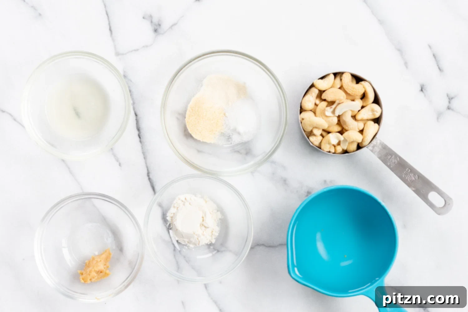 Ingredients for homemade vegan mozzarella in small bowls