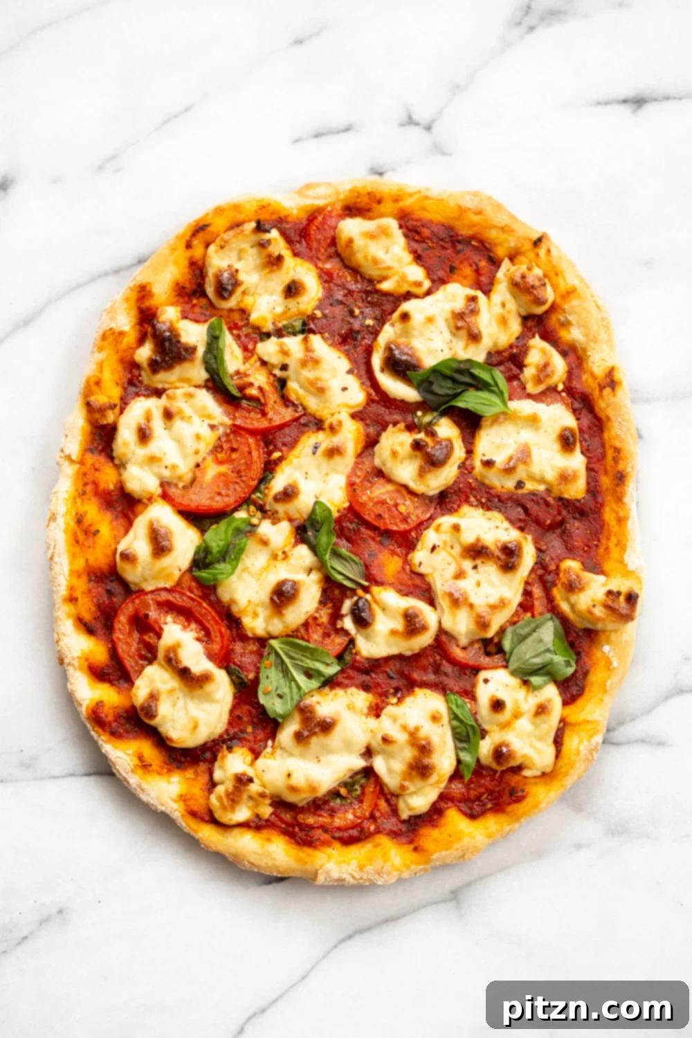 Our Vegan Margherita Pizza on marble
