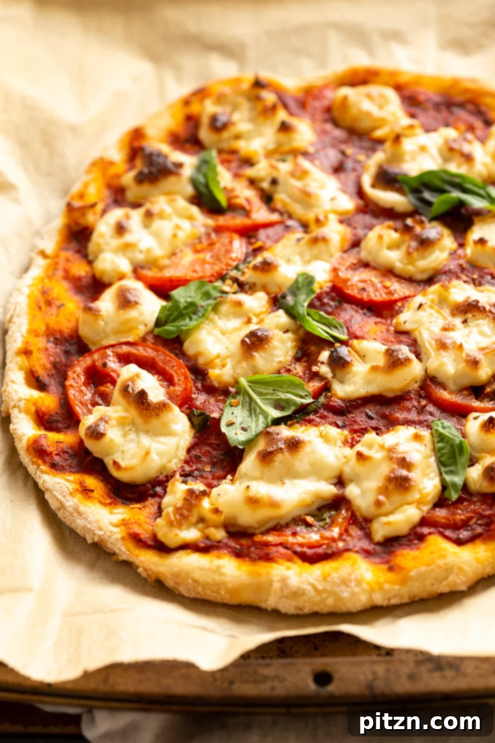 Our Vegan Margherita Pizza on parchment
