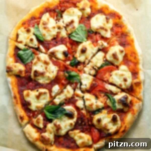 Our Vegan Margherita Pizza on parchment