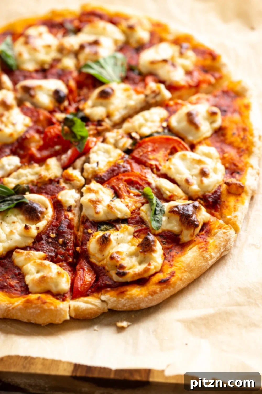 Our Vegan Margherita Pizza on parchment