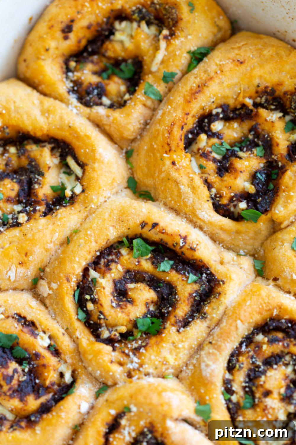 The Ultimate Vegan Pizza Rolls 15 Close-up of baked Vegan Pizza Rolls, revealing the golden-brown crust and inviting texture, perfect for a plant-based snack or party appetizer. #Vegan #Soyfree #Nutfree #Recipe #Veganpizzarolls #VeganRicha