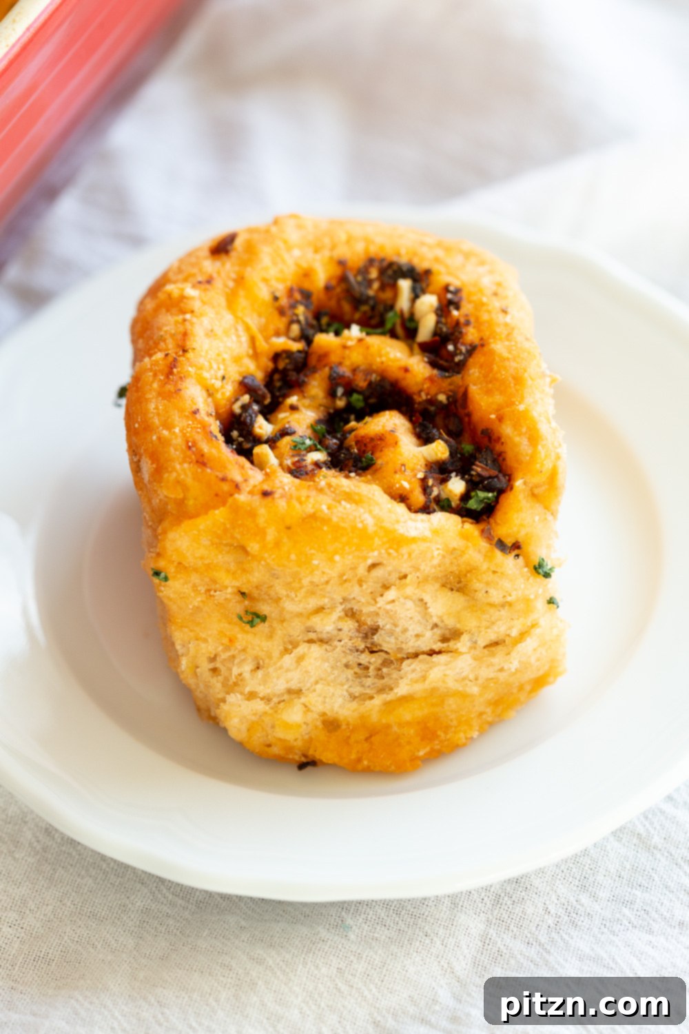 The Ultimate Vegan Pizza Rolls 16 A vibrant display of freshly baked Vegan Pizza Rolls, highlighting their golden crust and enticing swirl, a perfect representation of a delightful plant-based snack. #Vegan #Soyfree #Nutfree #Recipe #Veganpizzarolls #VeganRicha