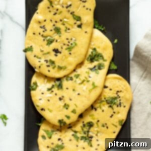 Vegan Gluten-Free Naan Flatbread. Grain-free Naan Recipe. 6 Main Ingredients, 1 Bowl, and 20 Minutes. Serve with curries or slice and serve with dips or add to bowls. Soyfree Nutfree options #Vegan #Glutenfree #grainfree #Veganricha #glutenfreenaan #grainfreenaan #chickpeaflournaan