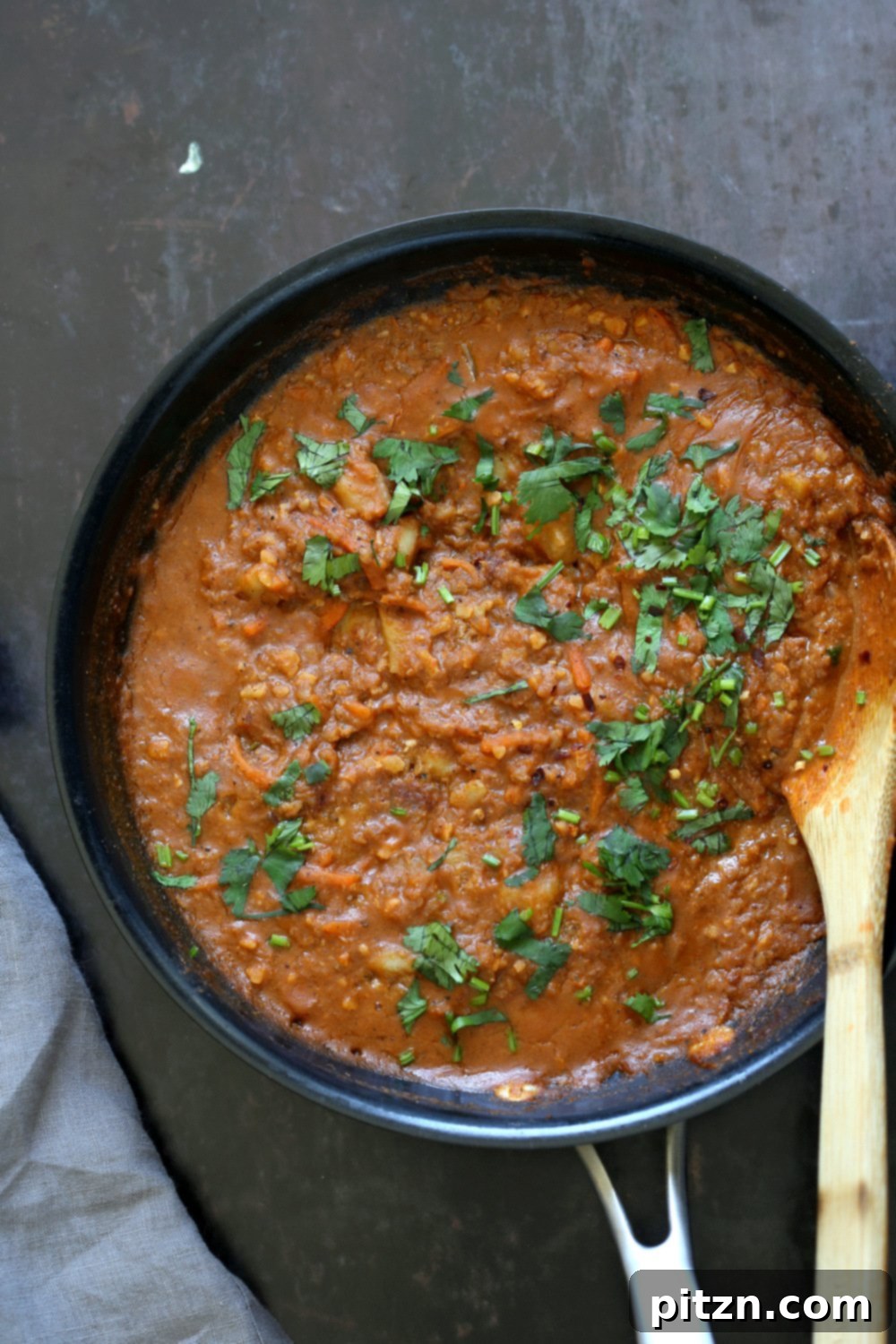 A full black skillet of Vegan Keema Madras, highlighting its rich texture and inviting aroma, ready for serving.