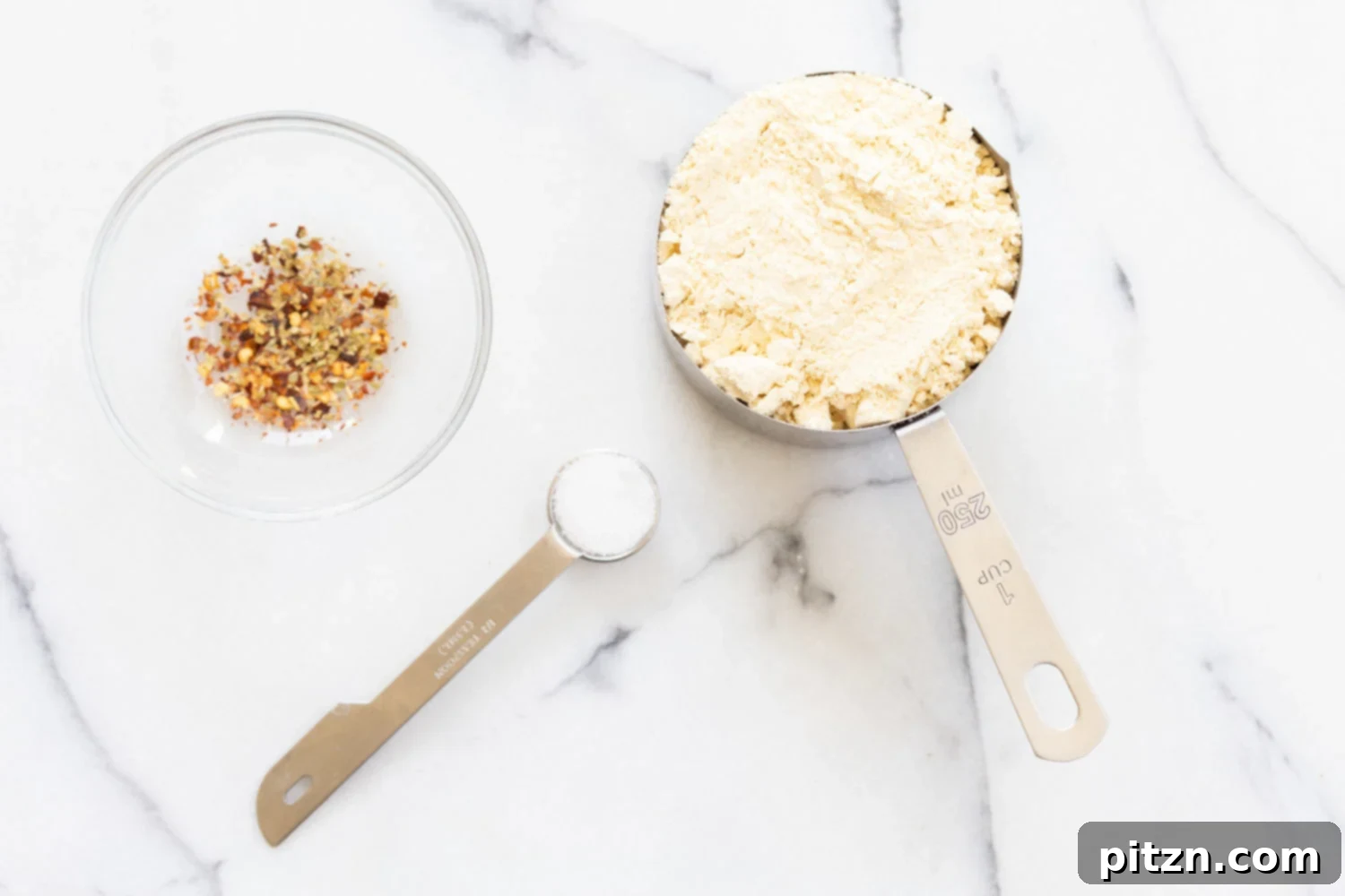 Ingredients for Vegan Socca in measuring cups and bowls