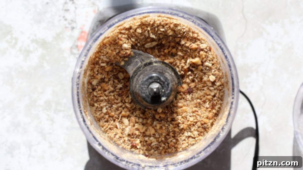 Chewy Vegan Caramel Banana Granola Bars 5 chopped nuts and oats in a small food processor