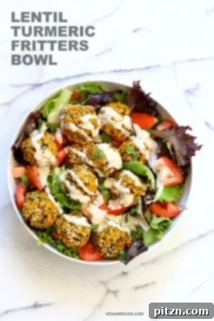 Turmeric Lentil Fritters Tomato Greens Bowl with Tahini Dill Sauce. Baked seedy golden lentil fritters served with fresh greens, juicy tomatoes, and a creamy tahini dill sauce for an easy lunch bowl. Vegan, Nut-free, Soy-free recipe, easily made Gluten-free.