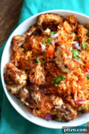 Easy Vegan Spanish Rice Bowl with Taco Roasted Cauliflower. An everyday meal made with common ingredients. Vegan, Gluten-free, Nut-free, Soy-free recipe.