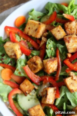 Tofu Transformed: Stir-fries, Marinades, Curries, Sandwiches, and Beyond 14 Crunchy Asian Salad With Baked Tofu & Garlic Soy Maple Dressing. Marinated and baked tofu served over crunchy greens, peppers, and carrots. Vegan, gluten-free recipe. | VeganRicha.com