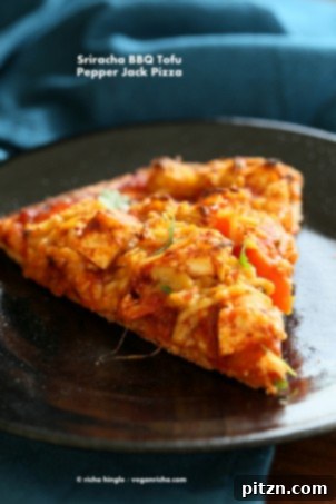 Tofu Transformed: Stir-fries, Marinades, Curries, Sandwiches, and Beyond 16 Vegan BBQ Tofu Pepper Jack Cheese Pizza, a savory and cheesy pizza option.