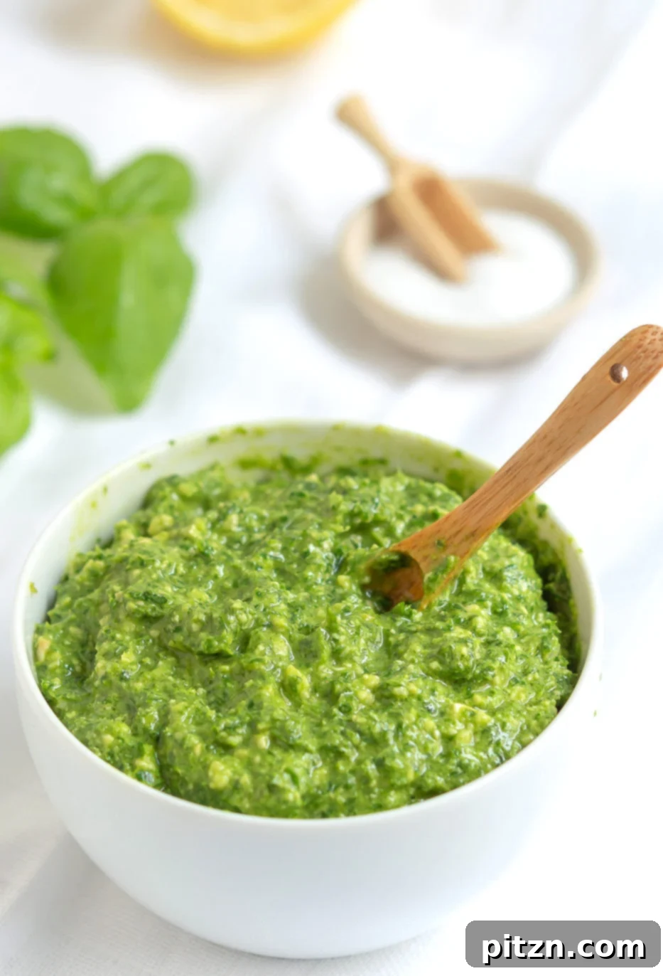 Effortless Plant-Based Pesto 2 Vegan Pesto in a white bowl, ready to be served or stored