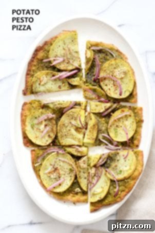 Effortless Plant-Based Pesto 4 Easy Potato Pesto Pizza with Thin Crust. Basil Spinach Pesto makes for a refreshing Pizza base topping with thin potato slices, onion and garlic. Bake or make on the grill. Vegan Soyfree Recipe. | VeganRicha.com #glutenfree #veganricha #vegan