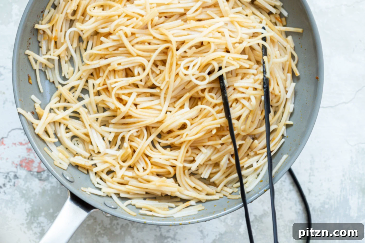 Zesty Lemongrass Tempeh with Sesame Noodles 8 Our sesame noodles in grey skillet
