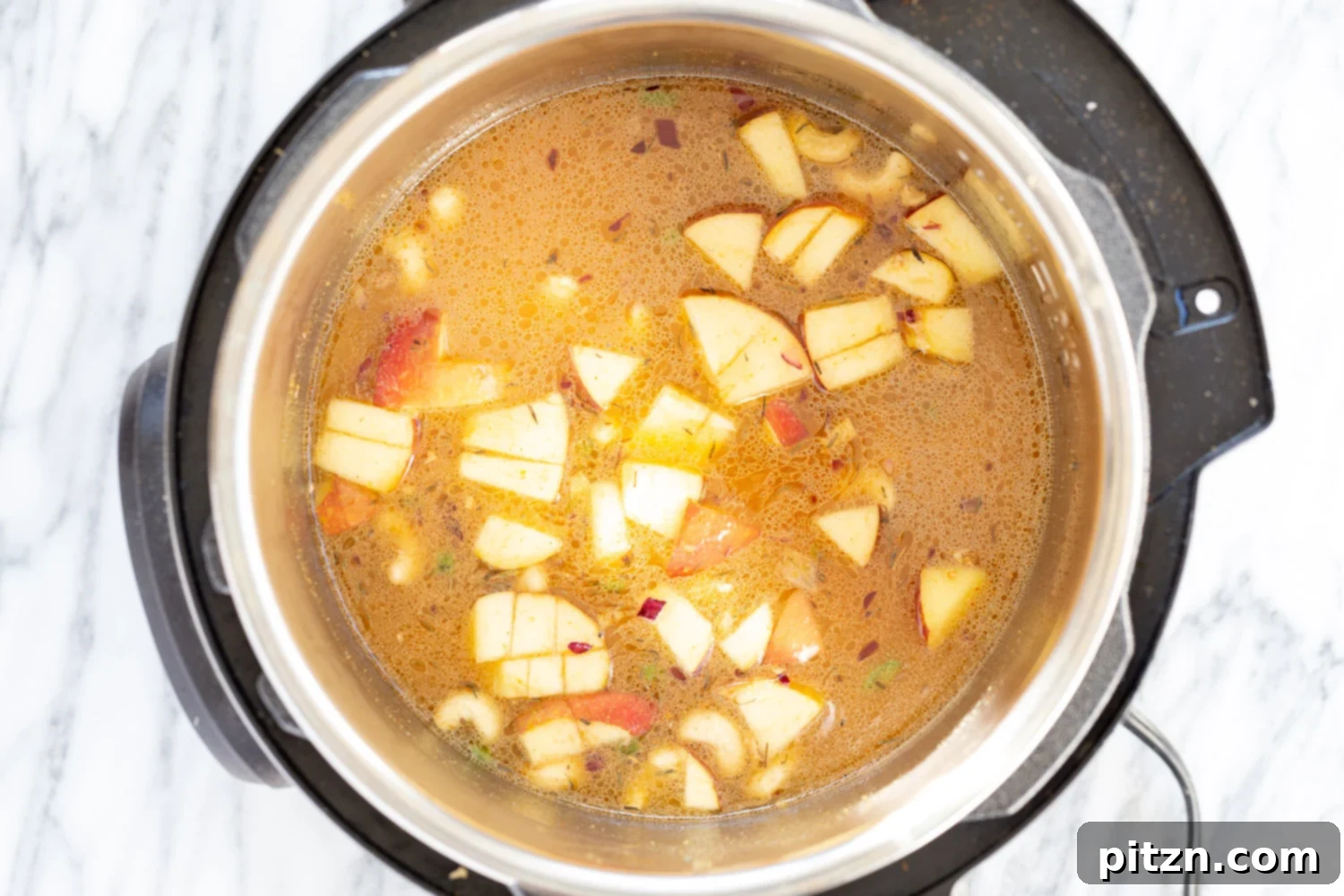 Velvety Vegan Instant Pot Pumpkin Soup 5 All the ingredients for Creamy Vegan Pumpkin Apple Soup assembled in the Instant Pot, ready for pressure cooking
