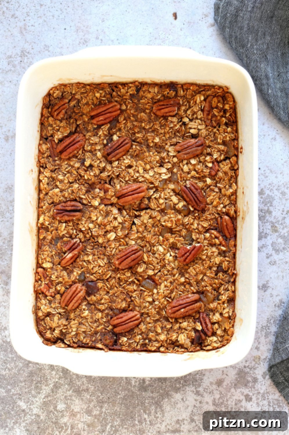 Oil-Free Vegan Gingerbread Oatmeal Delight 2 Vegan Gingerbread Baked Oatmeal in a white baking dish