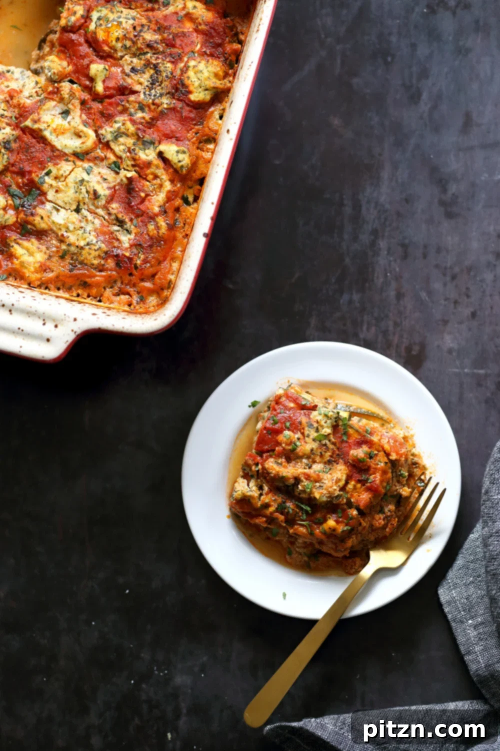 Creamy Vegan Gluten-Free Zucchini Lasagna with Tofu Ricotta 2 Our Vegan Gluten free Zucchini Lasagna in a cream baking dish and white plate