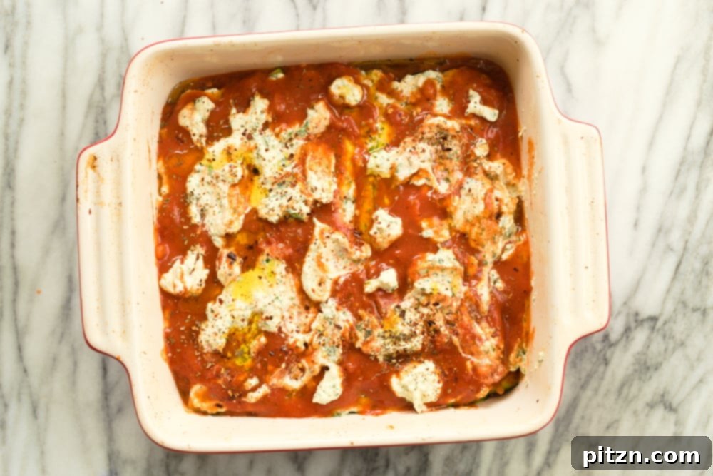 Creamy Vegan Gluten-Free Zucchini Lasagna with Tofu Ricotta 9 Our Vegan Gluten free Zucchini Lasagna in a cream baking dish