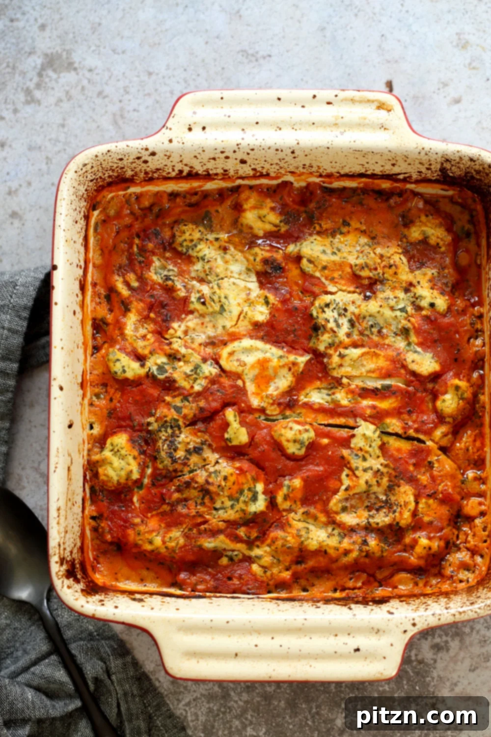 Creamy Vegan Gluten-Free Zucchini Lasagna with Tofu Ricotta 10 Our Vegan Gluten free Zucchini Lasagna in a cream baking dish