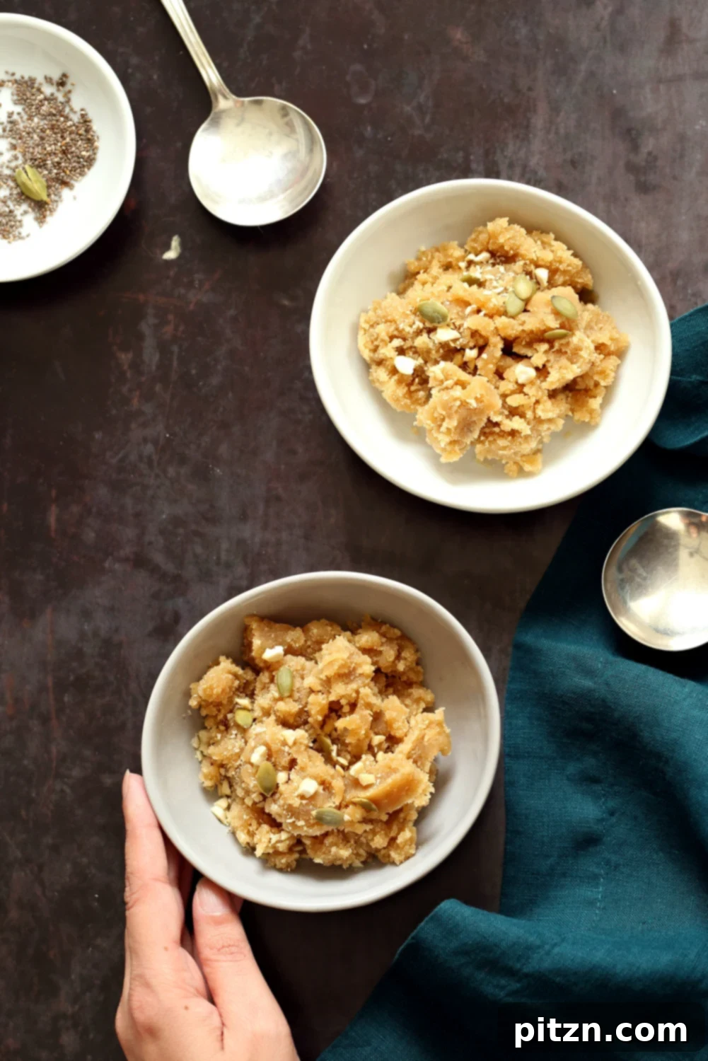 Vegan Almond Halwa - Instant Pot Badam Halwa in elegant white and grey bowls, garnished for a festive look.