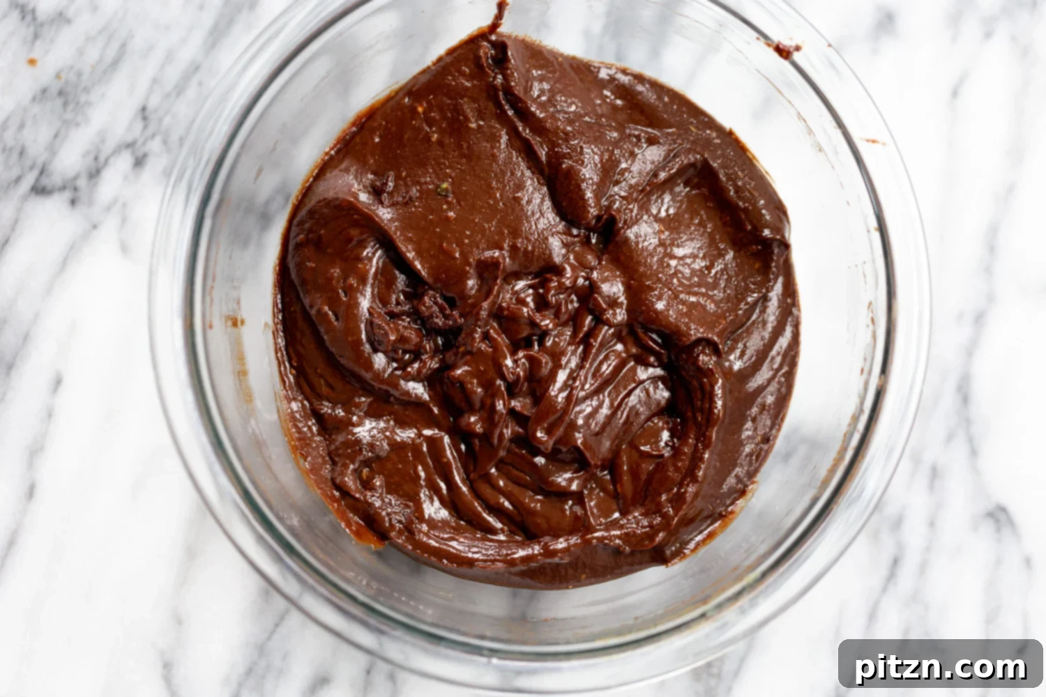 Easy 5-Ingredient Chocolate Avocado Freezer Fudge 8 The rich, dark chocolate avocado fudge mixture in a glass bowl, perfectly blended and ready for chilling.