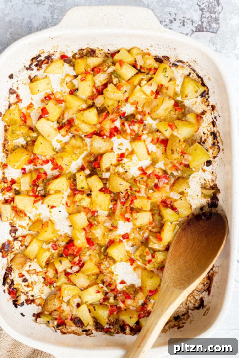 breakfast potatoes easy vegan baked Breakfast Potatoes in a white baking dish