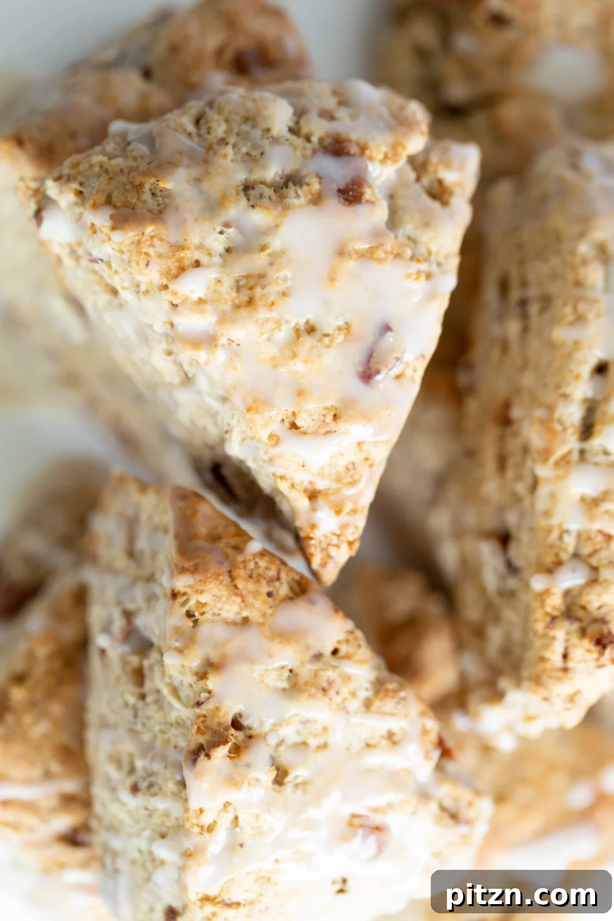 top view of freshly baked vegan banana scones arranged artfully, highlighting their golden tops and rustic charm
