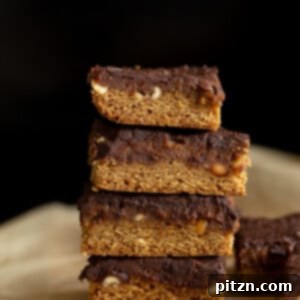 side view of a stack of vegan snickers snack bars