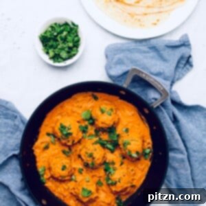 Creamy Vegan Malai Kofta Baked or Pan Fried 2 vegan malai kofta in a black skillet