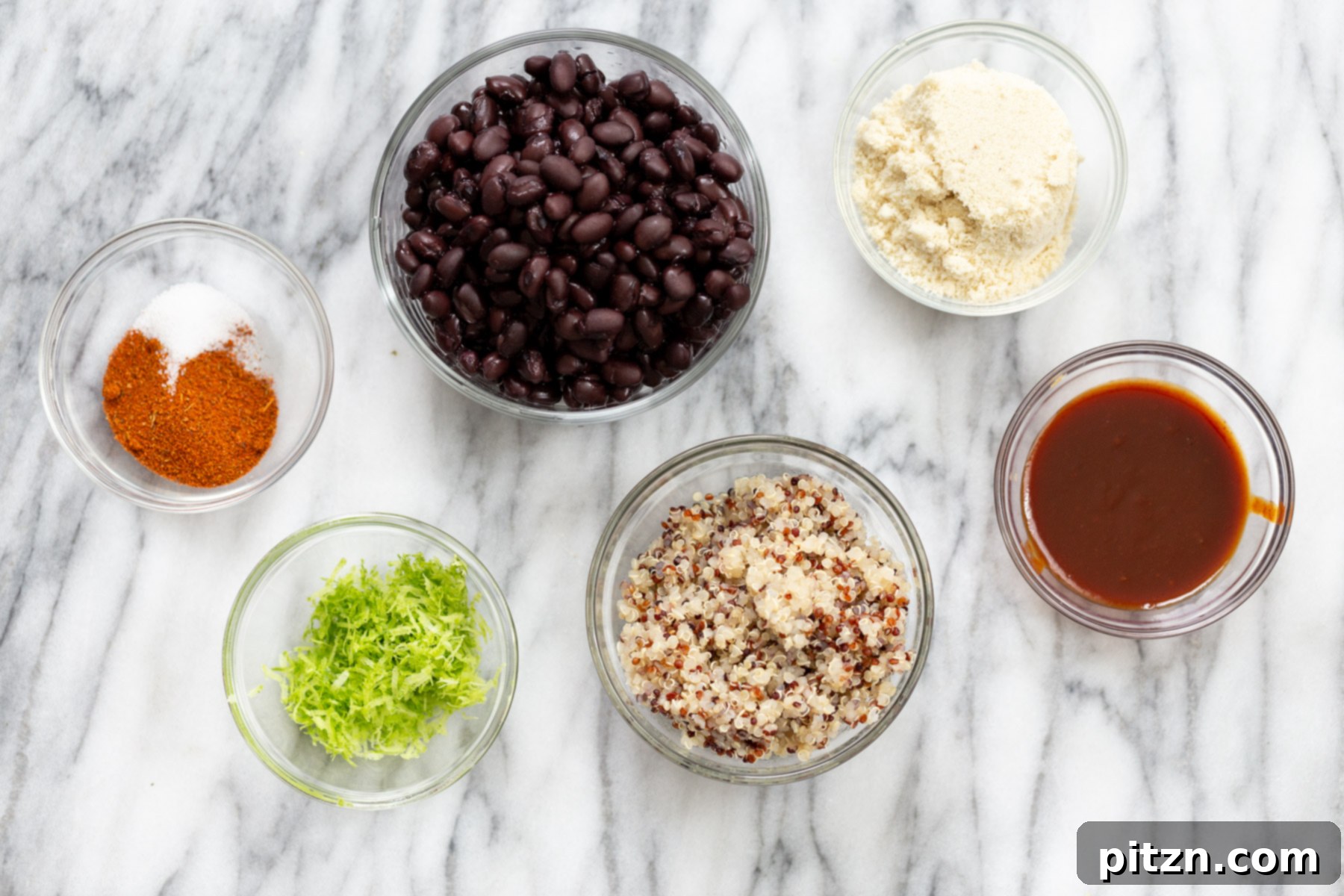 Quinoa Burger Ingredients An overhead shot showcasing a beautiful arrangement of fresh ingredients ready to be transformed into black bean quinoa burger patties.