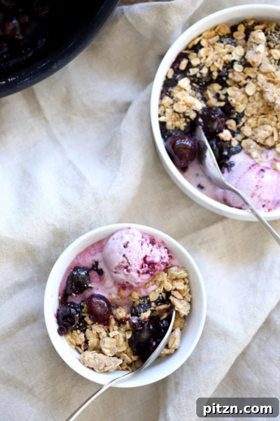 Summer Harvest: Your Guide to Seasonal Eats and Vegan Delights 11 Easy 1 Pot No Bake Vegan Cherry Blueberry Crisp, served with ice cream, featuring seasonal berries and stone fruit.