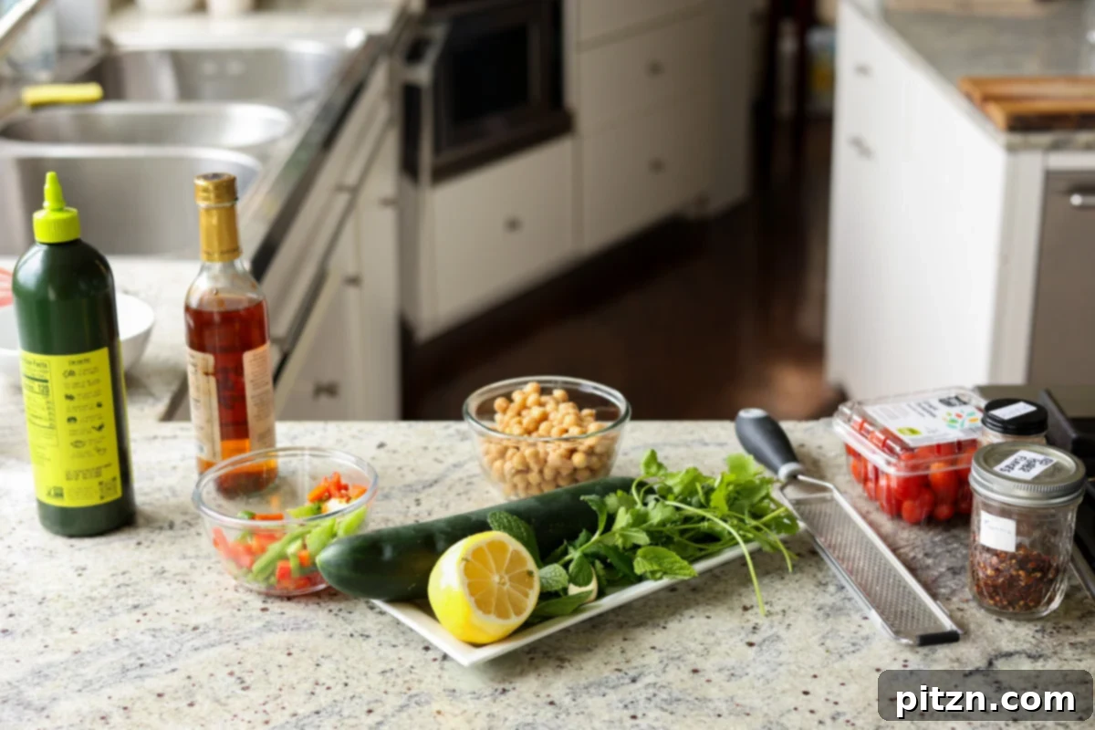 Balela Fresh Herby Chickpea and Garden Delight 6 Balela salad ingredients laid out on a kitchen counter, ready for preparation.