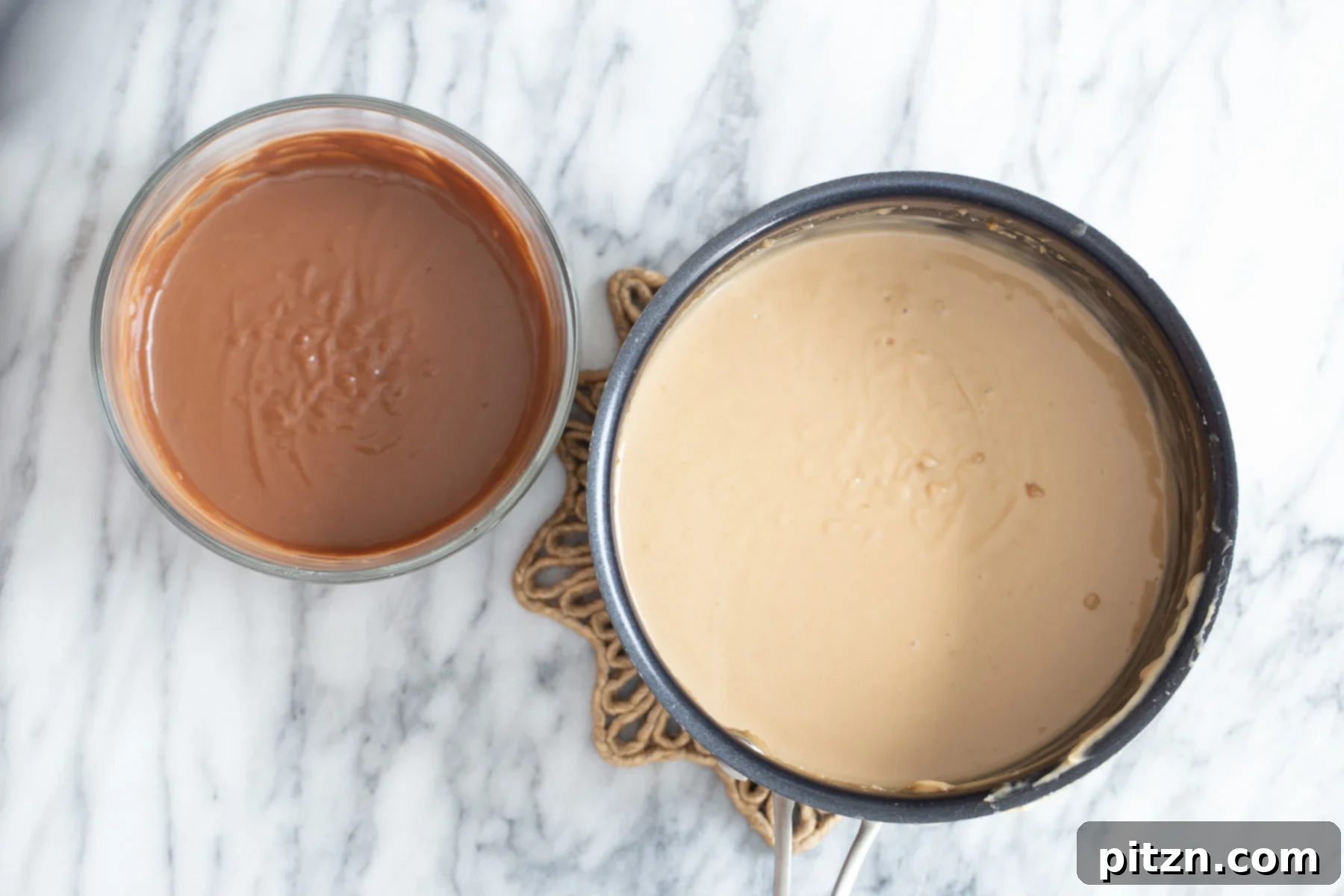 Peanut butter mousse and chocolate peanut butter mousse in separate bowls