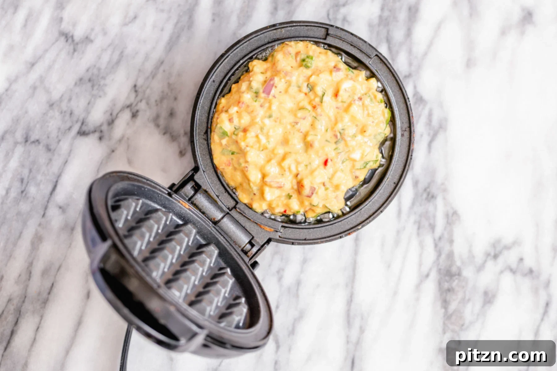 chickpea flour waffles chickpea flour waffle baking in a waffle iron